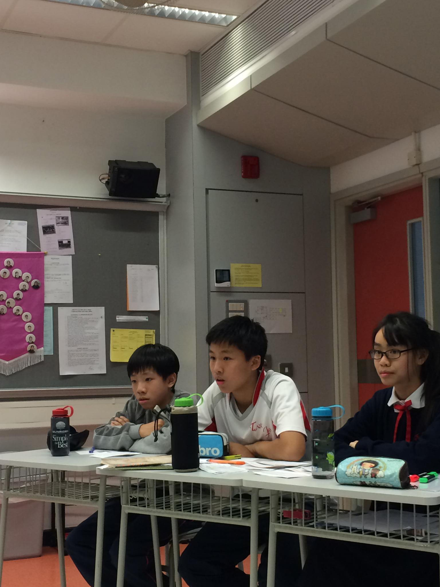 Our debating Team members are deep in thought for their speech.