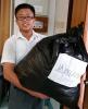 Student helpers are helping to sort out the donated materials collected from each class.