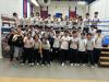 3D & 3E students are posing for a photo with the coach, Mr Soho.