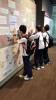 It ‘s time for the student activity time. They formed with groups together with self visiting the exhibitions of the books, currency and background etc. They are now trying to find out the answer through board, computer and exhibitions etc.