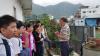 The tour guide was briefing students about the history of Tai O.