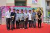 Students are posing for a group photo with Principal Wong and the Principal of Po Leung Kuk Chan Seng Yee Kindergarten after the performance.