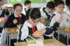 Students tasted their fruits during lunch time.