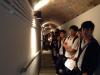 Students are visiting the covered tunnels of the caponier which led to the interior of the Redoubt.