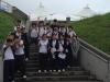 Students take a photograph in front of the core structure of the museum, formerly known as the Lei Yue Mun Fort.