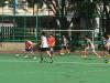 Some players are trying to intercept one of the students in order to get closer to the goal.