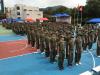 F.3 students are performing marching in the ceremony in order to demonstrate the learning outcomes of the leadership camp. 