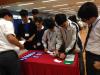 Students participate in a market stall activity which has been provided by another school. 