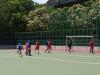 Players are very focused on defending the opponent's corner kick.