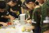 Students are preparing their lunch.