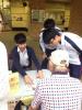 Students interact with elderly through mini games.