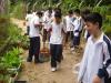 Students are cleaning up the farm together.