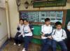 Students were waiting to get on the tram at the waiting area.