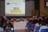 Ms Leung Pui Fan, the Assistant Principal of TNK, is introducing the school in the admission talk.