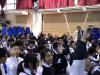 Students are actively participating in the assembly.