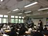 The wizards were explaining the game rules and worksheets to the students.
