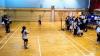 The students are having a badminton match.