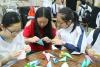 Our students were making paper handicraft flowers with the service users.