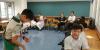 Teachers and students are having great fun together.