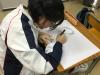 A student was working on the design of the class logo.