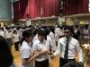 Teachers and student helpers were explaining the details of the activities to the students.