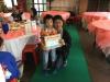 The family member of our student got the lucky draw gift from Principal Wong.