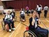 Teams needed to compete on wheelchairs in one of the team building activities.
