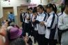 The students were playing games with the elderly. 
