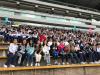 All teachers and students took a picture together.