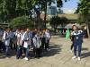 Students are listening to their tour guide introducing the history of the Foshan Ancestral Temple.JPG