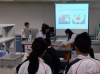 Our teachers were demonstrating the experimental steps.