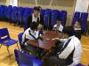 Students are trying hard to play all the cards before their opponents.