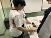 Students are having fun with a digital musical instrument.