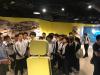 Students are gathered together at the aviation photo gallery.