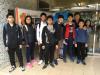 F1 and F3 students took a photo in front of the school. 