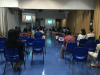 In order to minimize the risk of virus spreading, measures on enhancing social distancing are adopted. Parents in Activity room G03 are watching live broadcast of the talk.