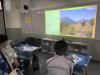 Students were attracted by the view of the Lantau Peak and they were watching the video attentively.