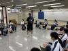 Students are following the tutor's instruction to play Djembe.