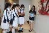 Students are also interested in the art work displayed in the office. (Photo credit: JYC Girls Impact Foundation)