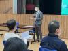Principal Wong was giving a talk to parents.