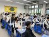 Many students were trying to answer questions.