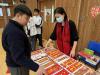 Students play games to get candies on the activity day.