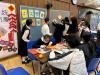 Members of the Chinese Society are decorating the board.