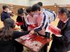 Students play games to understand more about Chinese Lunar New Year.