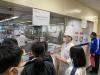 Students were attentively listening to the speaker introducing the Fondant Cake.