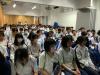 The students are attentively listening in the talk.