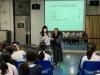 Ms. Li MY, the head of the Living Technology Department, is presenting a souvenir to the speaker.