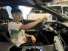 Students enjoy taking the driver seat on the new cars on display in the GAC Museum.