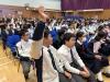 Students respond actively to the questions during the talk.