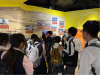 Students learn about the history of the Hong Kong Airport.